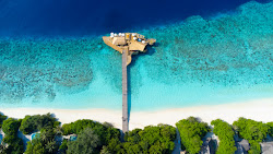 Foto von Hedufuri Island Strand und die siedlung