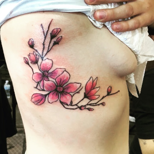 Explore cool guitar tattoo ideas, creative tattoo ideas in Ottumwa, available at Family Tradition TattoosPiercings