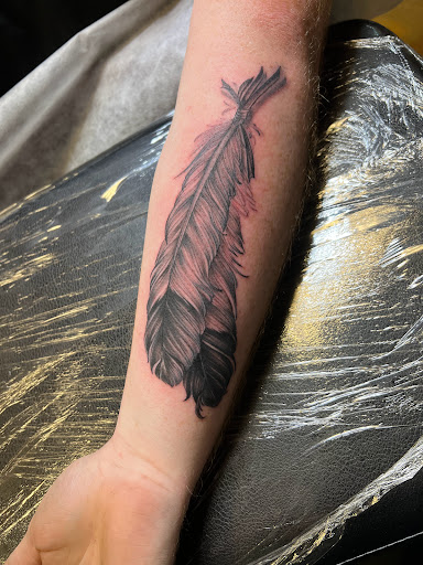 Explore god first tattoo ideas, creative tattoo ideas in Redmond, available at Four Flames Tattoo Studio