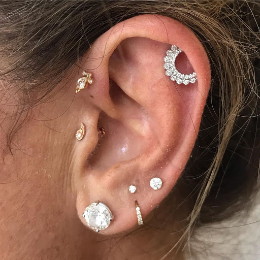 Find owl tattoo ideas for guys for your next unique tattoo in New York at MARIA TASH Fine Jewelry & Luxury Piercing
