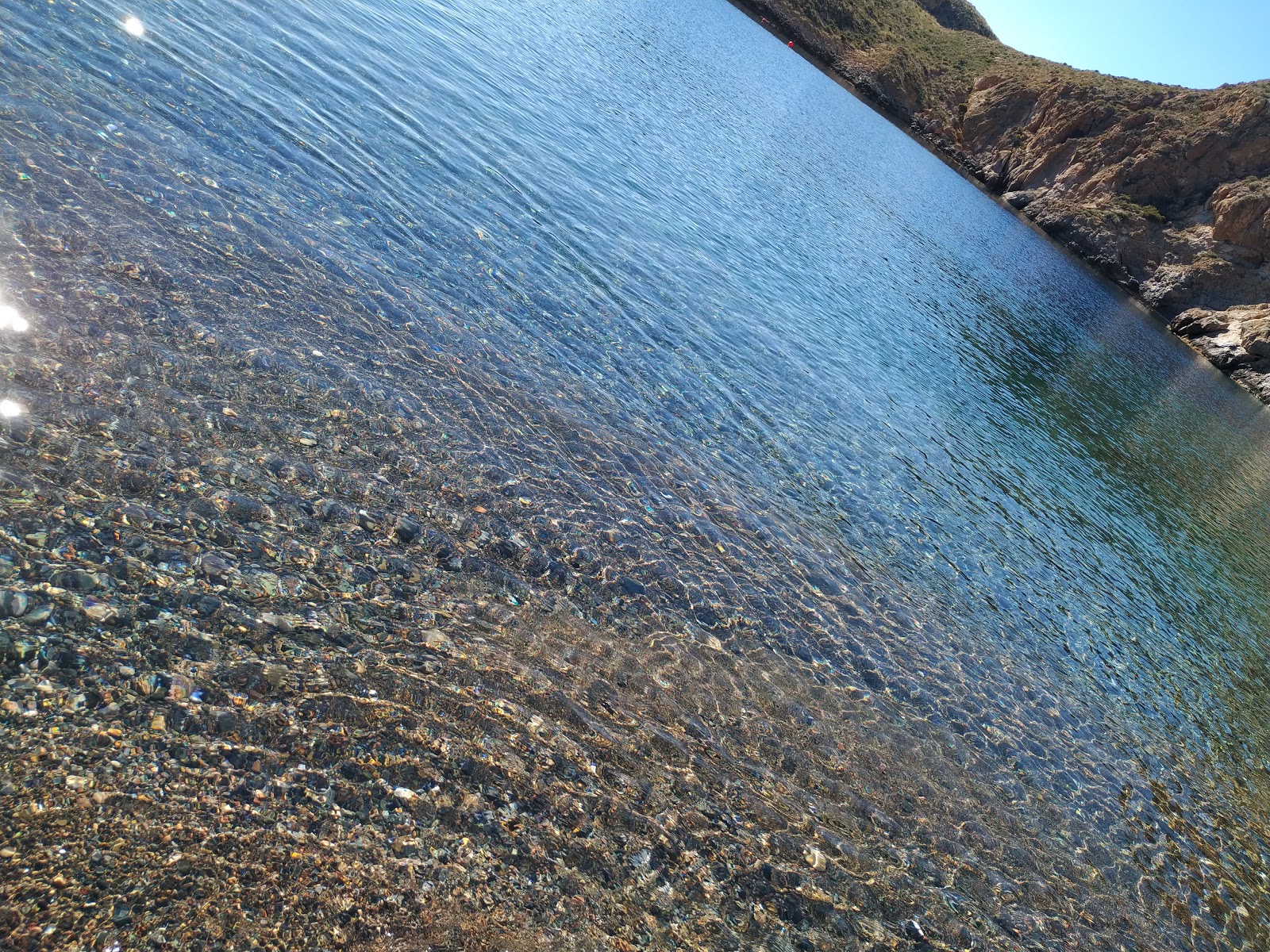 Playa Cala Cerrada'in fotoğrafı doğal alan içinde bulunmaktadır
