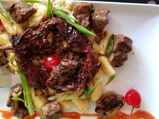 Latin American Restaurant «De La Vega Restaurante y Galeria», reviews and photos, 128 N Woodland Blvd, DeLand, FL 32720, USA