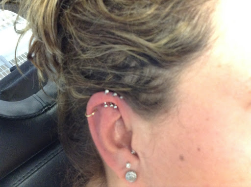 Explore cross tattoo ideas male, creative tattoo ideas in Seymour, available at American Gypsy Tattoo Corp.