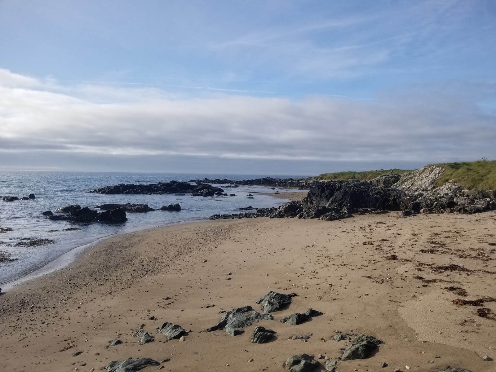 Fotografija Oldmill Bay Beach priljubljeno mesto med poznavalci sprostitve