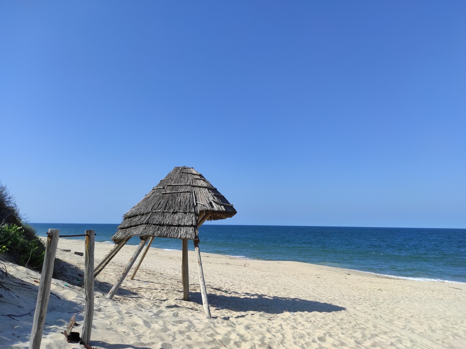 Fotografija Praia de Macaneta z svetel pesek površino