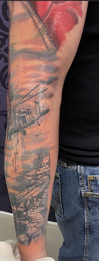 Explore hand tattoos men ideas, creative tattoo ideas in Conroe, available at Nicoles Tattoos and Piercings