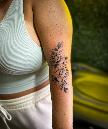 Explore female elbow tattoo ideas, creative tattoo ideas in Plano, available at Inked By Cory