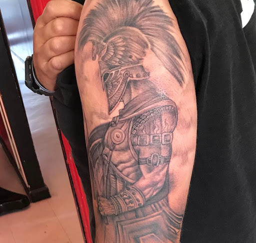 Find dog tattoo idea for your next unique tattoo in El Paso at Pumping Ink Tattoo Parlor