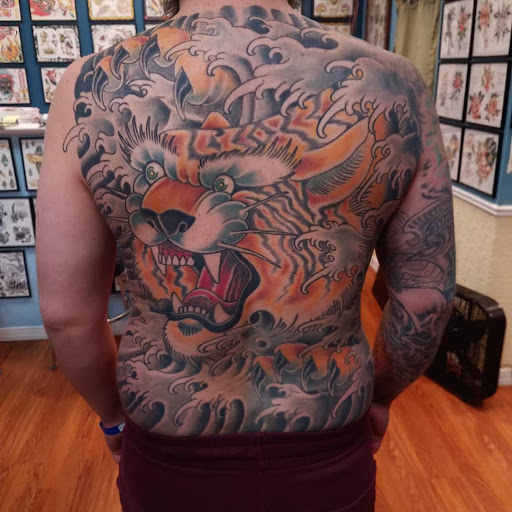 Explore leo tattoo ideas for men, creative tattoo ideas in Egg Harbor Township, available at Mr. Blue Sky Tattoo