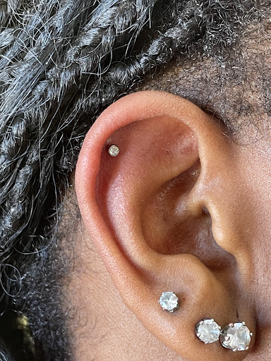 Explore fish tattoo ideas for females, creative tattoo ideas in Chapel Hill, available at Golden Falcon Tattoo and Piercing