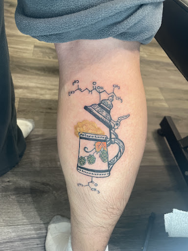 Explore tattoo word cover up ideas, creative tattoo ideas in Trinity, available at Bella Donna Ink
