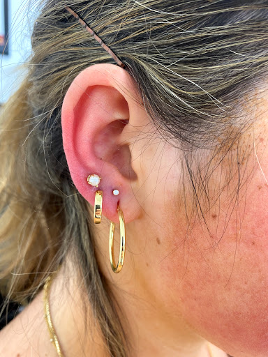 Explore cross with names tattoo ideas, creative tattoo ideas in Myrtle Beach, available at Professional Body Piercing by Jackie