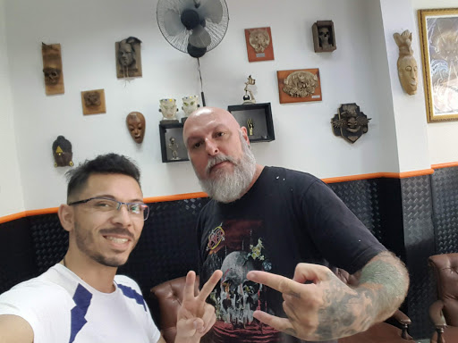 Logo da empresa - rainbowtattoo