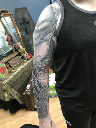 Explore tattoo ideas for lower stomach, creative tattoo ideas in Bangor, available at Blind Faith Tattoo Studio