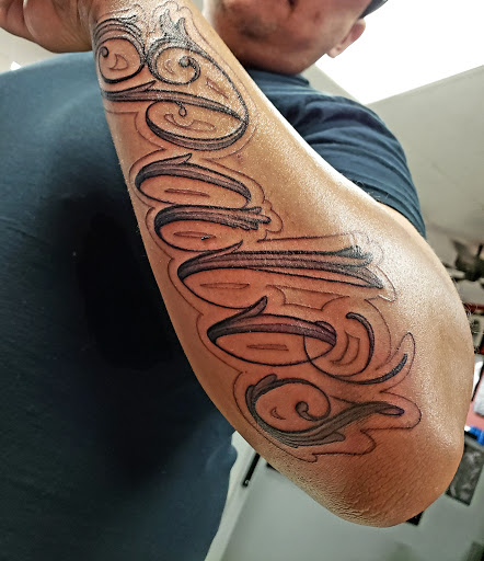 Tattoo Shop «Wyze Guyz Tattoo Parlor», reviews and photos, 3012 Lee Trevino Dr B, El Paso, TX 79936, USA