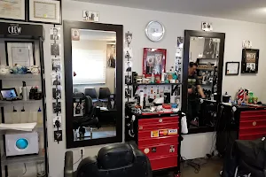 The Men’s Den Barbershop image
