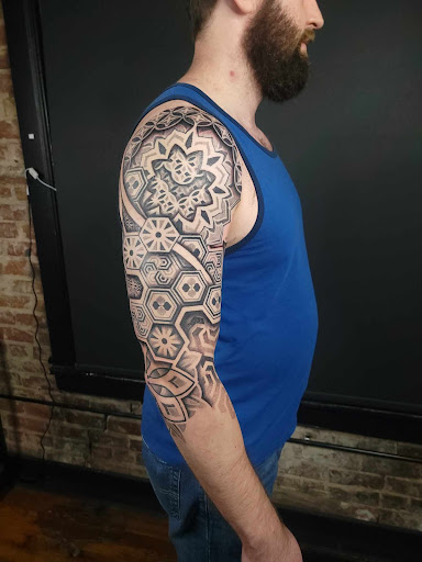 Find aquatic tattoo ideas for your next unique tattoo in Omaha at Collective Hive Tattoo