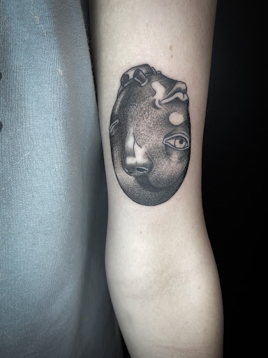 Explore hopeless romantic tattoo ideas, creative tattoo ideas in Buford, available at Wild Tribe Tattoos and Piercings
