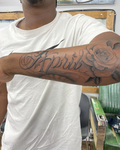 Explore cross tattoo ideas for guys, creative tattoo ideas in Baltimore, available at Rippd Canvas Tattoo Shop Artists Social Club