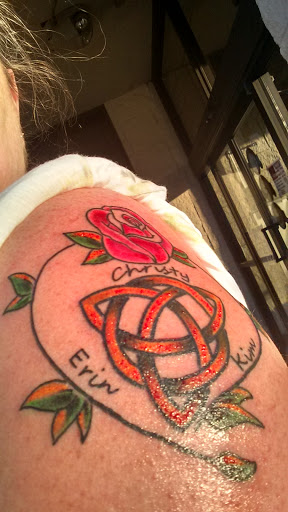 Explore rose tattoo ideas for guys, creative tattoo ideas in Bristol, available at Sacred Ink