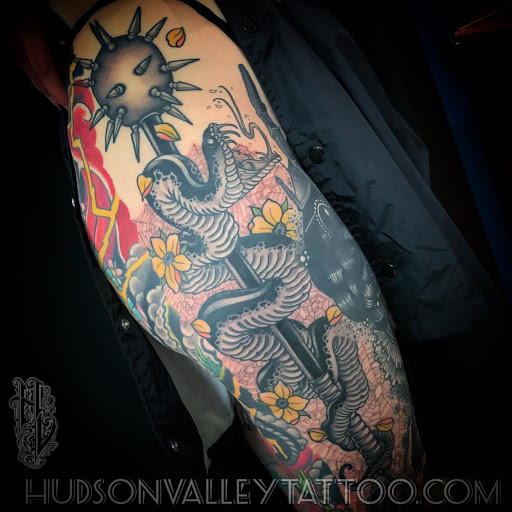 Explore male flower tattoo ideas, creative tattoo ideas in Wappingers Falls, available at Hudson Valley Tattoo Company
