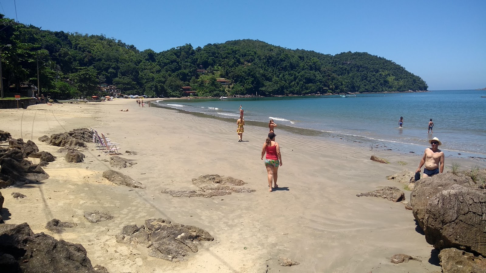 Foto di Praia da Almada con una superficie del sabbia beige fine