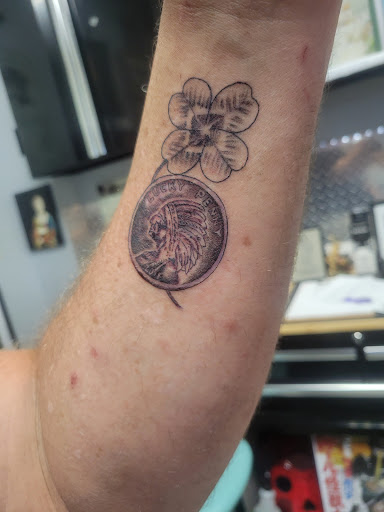 Explore ac dc tattoo ideas, creative tattoo ideas in Columbia, available at Brightmoor Tattoo