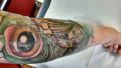 Find wolf tattoo ideas for females for your next unique tattoo in Green Bay at Skinny Buddha Tattoo