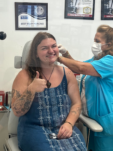 Explore dancing tattoo ideas, creative tattoo ideas in Myrtle Beach, available at Professional Body Piercing by Jackie