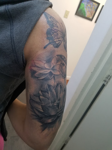 Explore ectopic pregnancy tattoo ideas, creative tattoo ideas in Jeannette, available at Damaged Legacy Studios