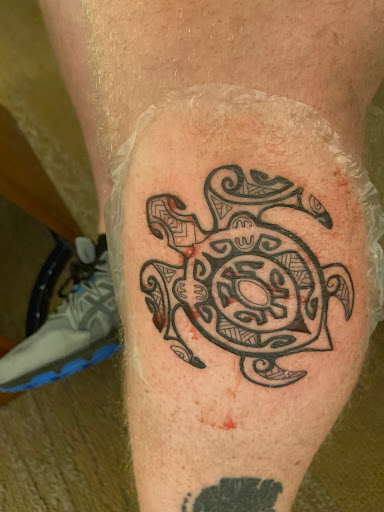 Explore marigold tattoo ideas, creative tattoo ideas in Honolulu, available at Aloha Tattoo Waikiki Hilton Hawaiian Village Rainbow Bazaar