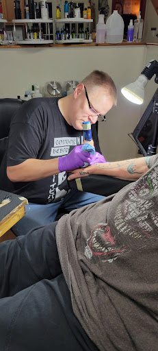 Explore spider man tattoo ideas, creative tattoo ideas in Georgetown, available at Grasshopper Tattoo Studio