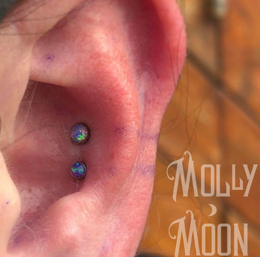 Explore neurodivergent tattoo ideas, creative tattoo ideas in Oshkosh, available at Piercings by Molly Moon at 920 Tattoo and Piercing