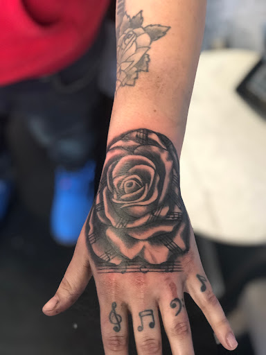 Explore november birth flower tattoo ideas, creative tattoo ideas in Saint Paul, available at Inception Studios - Modern Professional Tattooing