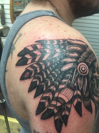 Explore music tattoo ideas sleeve, creative tattoo ideas in Eureka Springs, available at Sailors Luck Tattoo