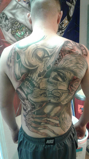 Explore wolf chest tattoo ideas, creative tattoo ideas in Albuquerque, available at A Touch of Ink Tattoo & Art Gallery
