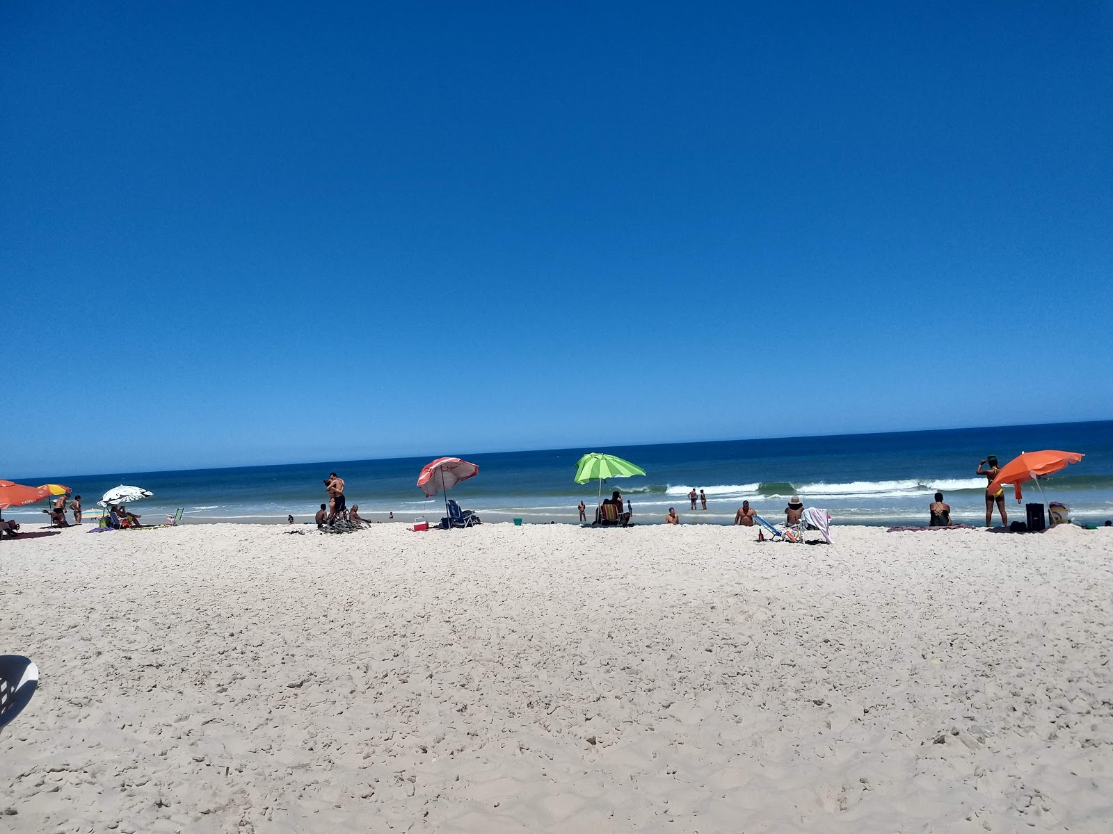 Foto van Praia Seca met recht en lang