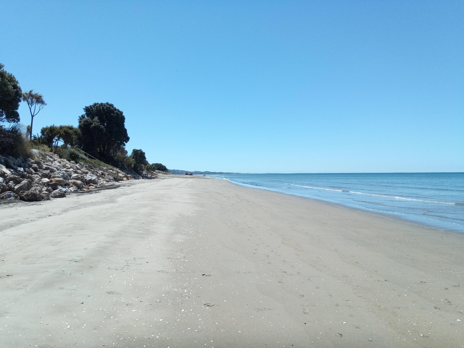 Foto de Pakawau Beach con arena beige superficie