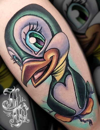 Explore caterpillar tattoo ideas, creative tattoo ideas in Lombard, available at New Hope Tattoo