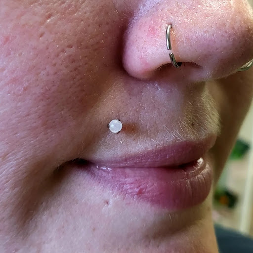 Explore knee tattoo ideas for woman, creative tattoo ideas in Memphis, available at Rose Quartz Body Adornment LLC