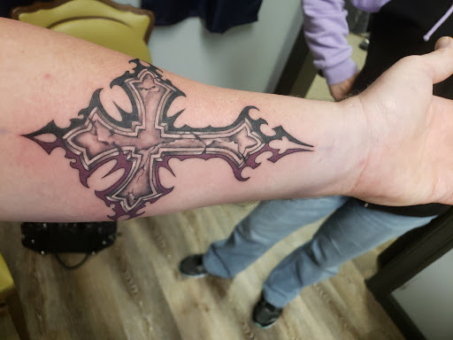 Explore arsenal tattoo ideas, creative tattoo ideas in Tewksbury, available at Lucid Arts Tattoo Studio
