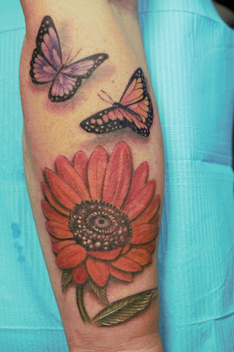 Explore thigh tattoo idea, creative tattoo ideas in Arlington, available at The Chosen One Ink