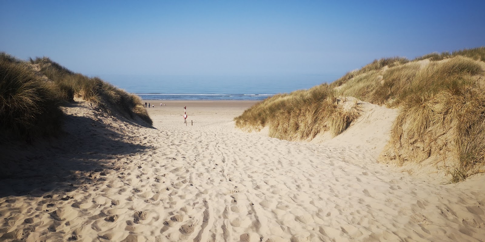 Foto van Harlech Strand met gemiddeld niveau van netheid