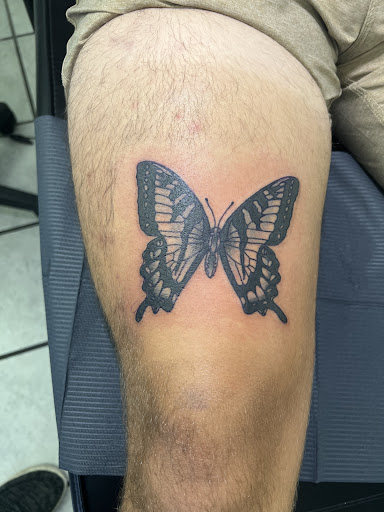 Explore scroll tattoo ideas, creative tattoo ideas in Daytona Beach, available at Studio 21 Tattoo & Piercings Daytona Beach