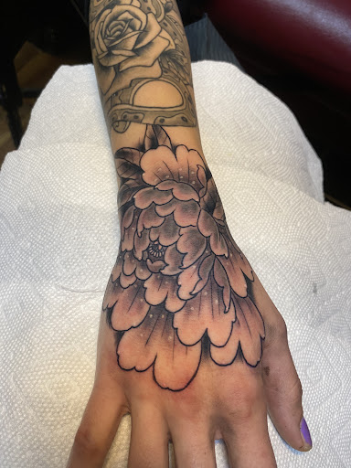 Explore unconditional love tattoo ideas, creative tattoo ideas in Peabody, available at Thousand Needles Tattoo