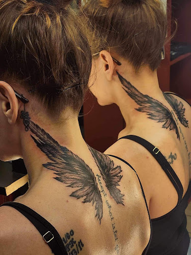 Explore 2001 tattoo ideas, creative tattoo ideas in Laconia, available at Circus Tattoo