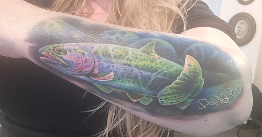 Explore tattoo ideas for back of leg, creative tattoo ideas in Spokane, available at Anchored Art Tattoo