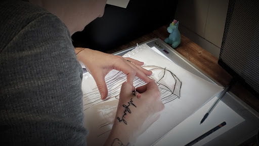 Find inbetween boob tattoo ideas for your next unique tattoo in Minocqua at Whisky Rose Tattoo Parlor