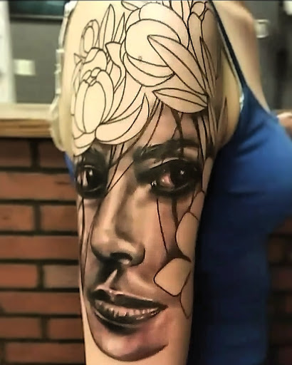 Find harley quinn and poison ivy tattoo ideas for your next unique tattoo in Warsaw at Mosthigh Tattoos & Body Piercings