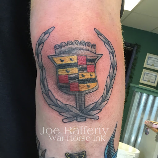 Explore small coraline tattoo ideas, creative tattoo ideas in Kent, available at War Horse Ink